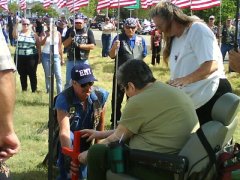 Mom carries picture of son at memorial